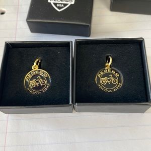 Pedego gold charms-2 included.  New in Box
